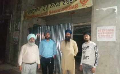 Shillong Sikhs outside their Gurdwara Under construction